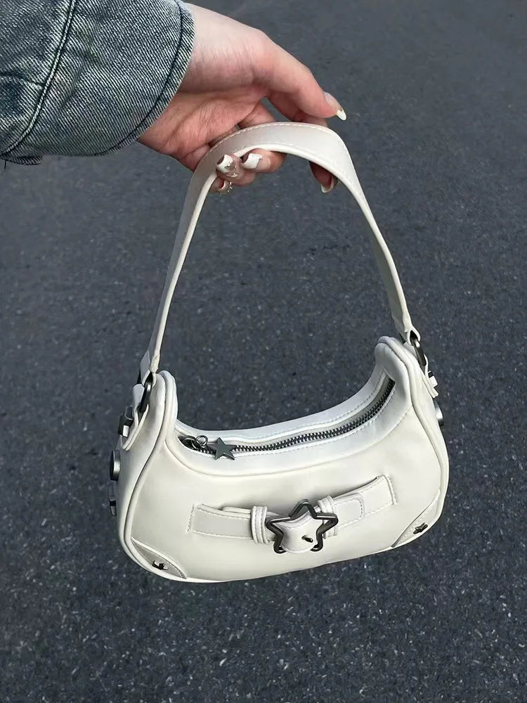 The New 2025 Baguette Bag for Women Is A Trendy Underarm Bag Made of Pu Leather with A Unique Star-shaped Buckle