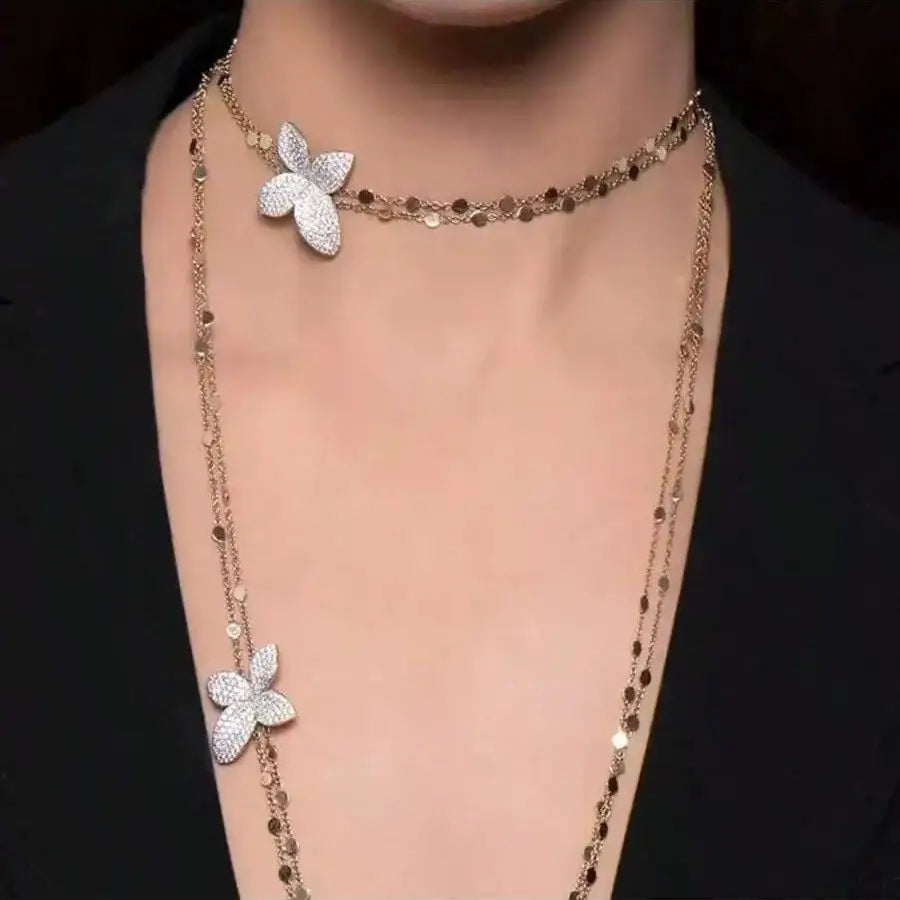 A petal pendant necklace, layered with double layered rhinestones, exuding a sophisticated banquet accessory for women