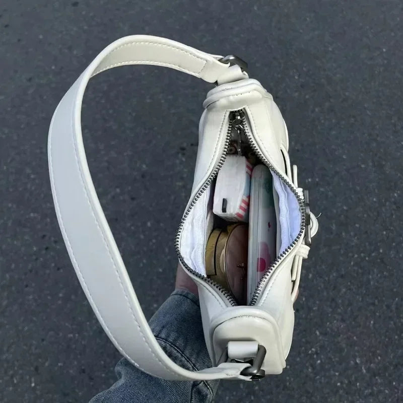The New 2025 Baguette Bag for Women Is A Trendy Underarm Bag Made of Pu Leather with A Unique Star-shaped Buckle