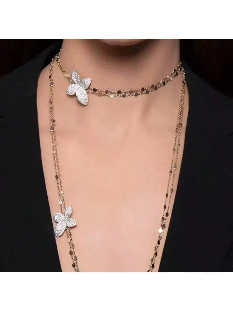 A petal pendant necklace, layered with double layered rhinestones, exuding a sophisticated banquet accessory for women