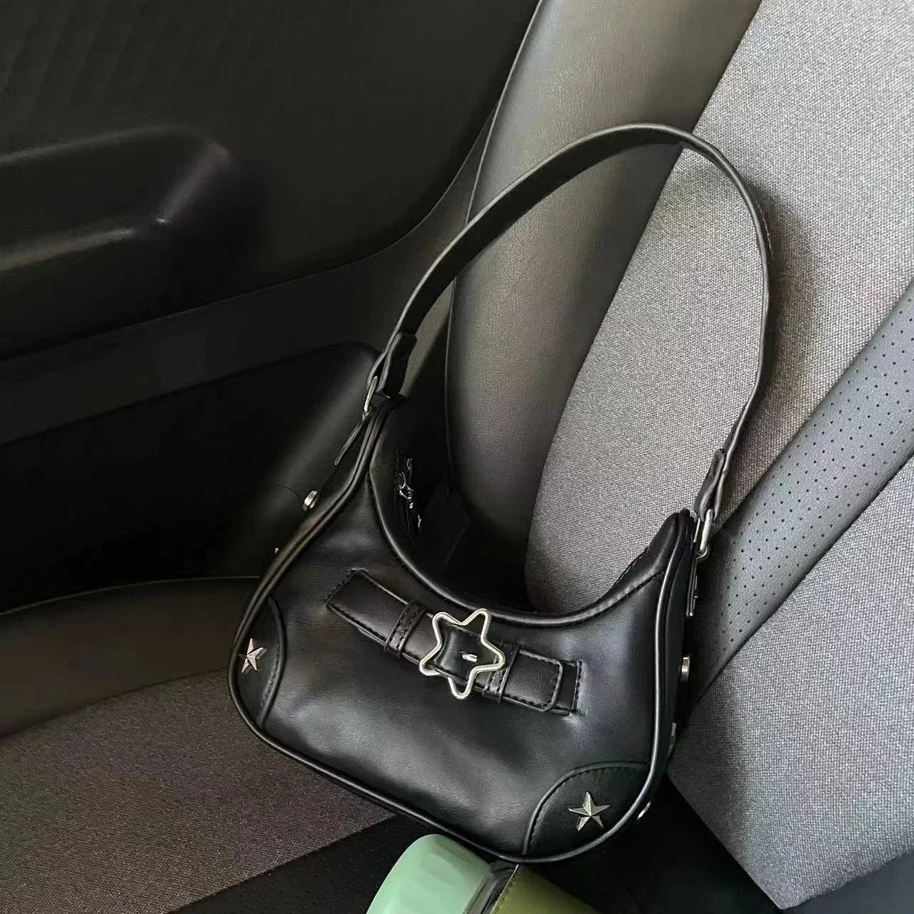 The New 2025 Baguette Bag for Women Is A Trendy Underarm Bag Made of Pu Leather with A Unique Star-shaped Buckle