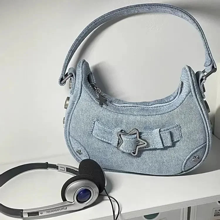 The New 2025 Baguette Bag for Women Is A Trendy Underarm Bag Made of Pu Leather with A Unique Star-shaped Buckle