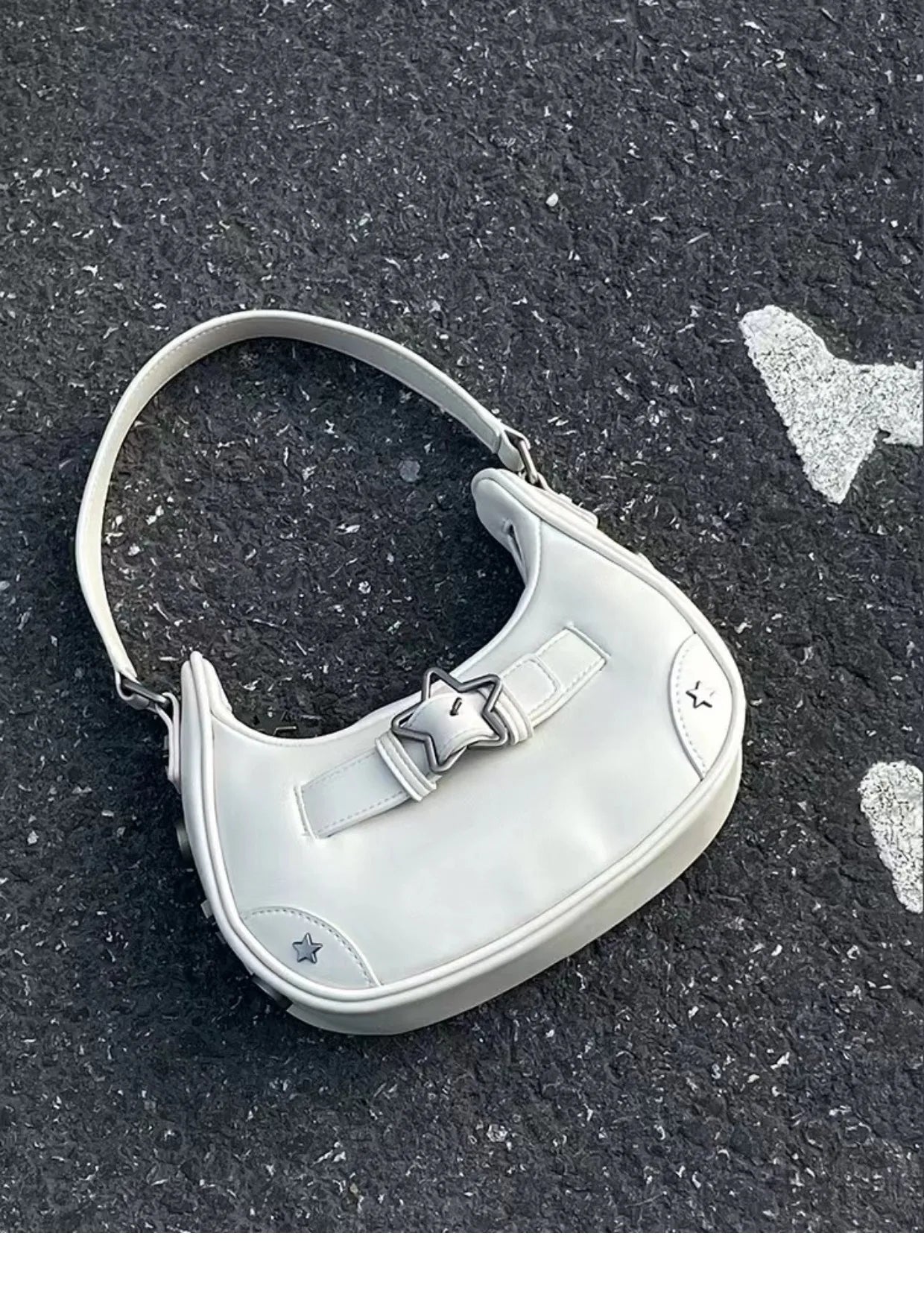The New 2025 Baguette Bag for Women Is A Trendy Underarm Bag Made of Pu Leather with A Unique Star-shaped Buckle